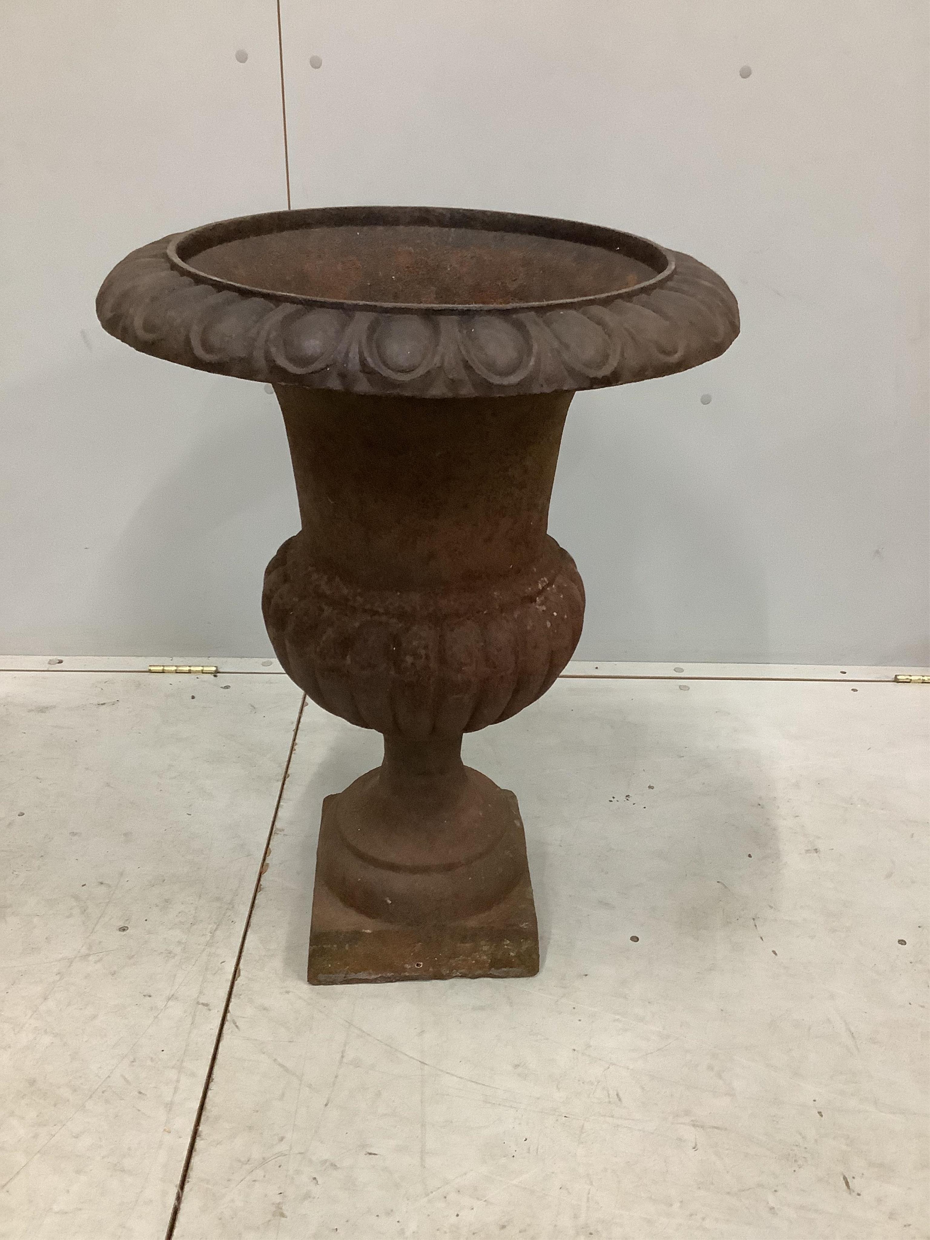 A Victorian style cast iron campana garden urn, diameter 55cm, height 74cm. Condition - fair